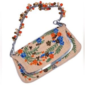 RARE RAFE BAG WITH EMBROIDERED AND BEADED EMBELLISHMENTS.